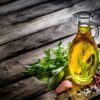 Food backgrounds: olive oil, herbs and spices with copy space